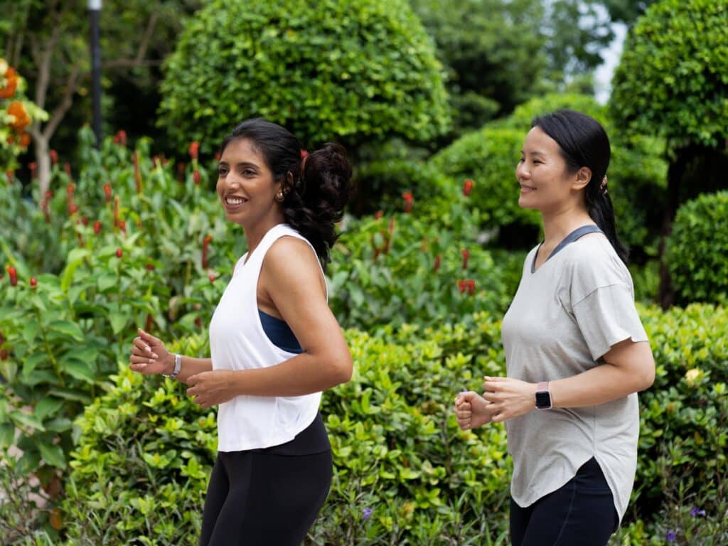 Two women jogging outdoors