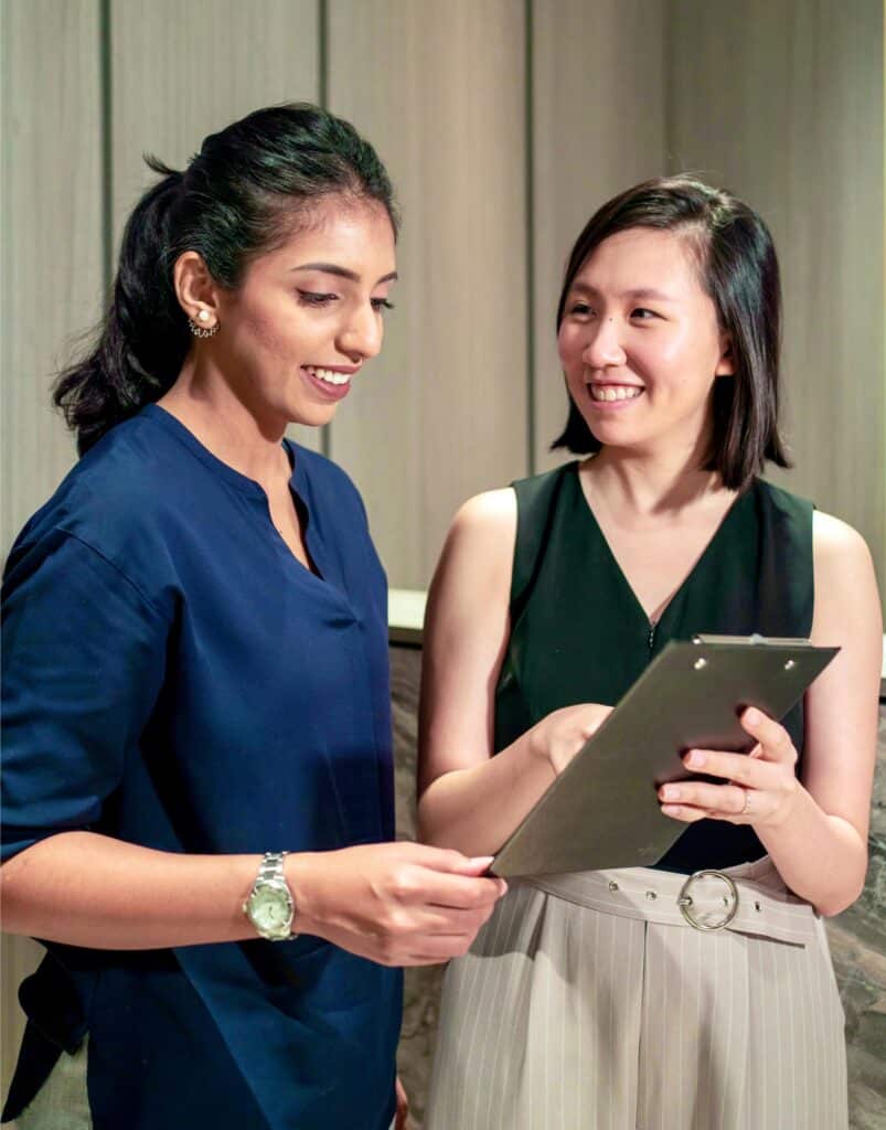 Aesthetic treatment room featuring advanced skincare equipment and comfortable seating