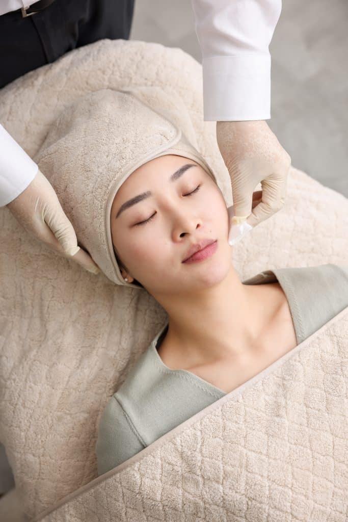 Woman having a facial cleanse 2