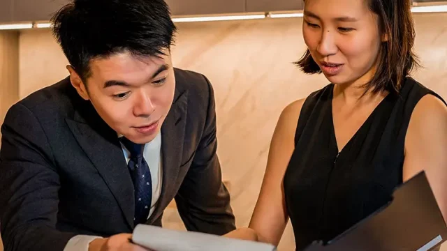 Doctor checking a list